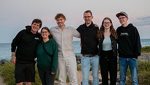 Group picture at the beach.